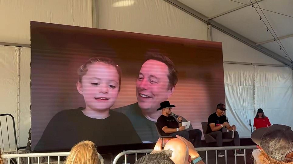 Latest on Moment Elon Musk is joined by smiling daughter Azure, four, on livestream event – a week after dumping her mother